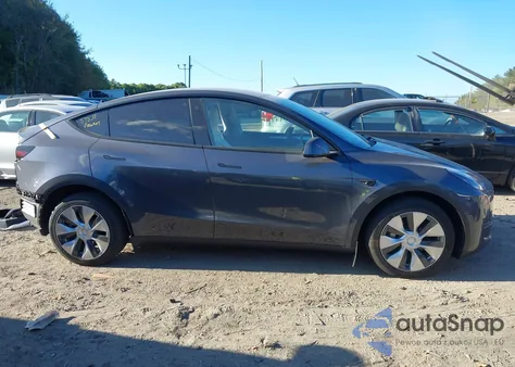 2023 Tesla Model Y Awd/Long Range Dual Motor All-Wheel Drive z USA, uszkodzony, nr VIN 7SAYGDEE6PA091538
